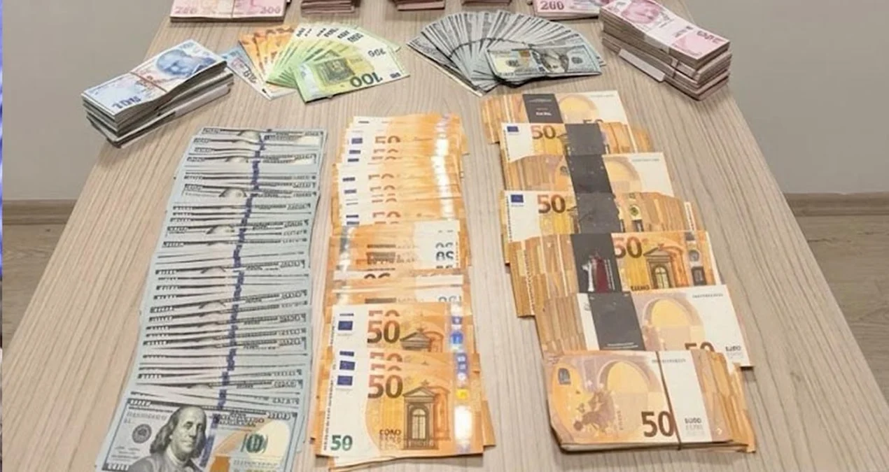 Ankara Etimesgut’ta yakalanan dolandırıcılık şüphelilerinden ele geçirilen para